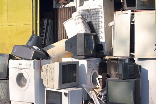 House clearance team managing items for disposal in Sydenham